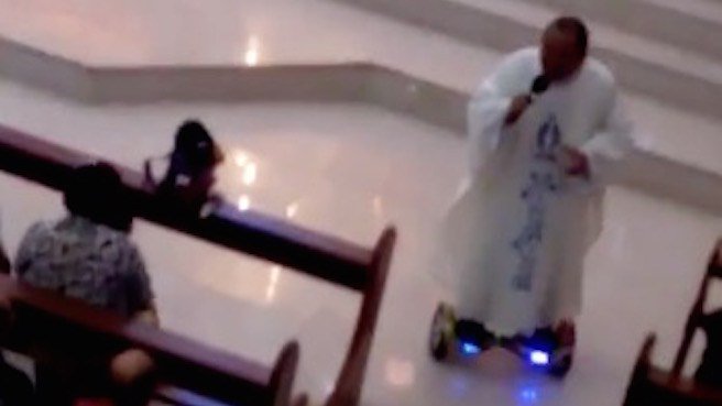 priest-rides-hoverboard-video-christmas-mass